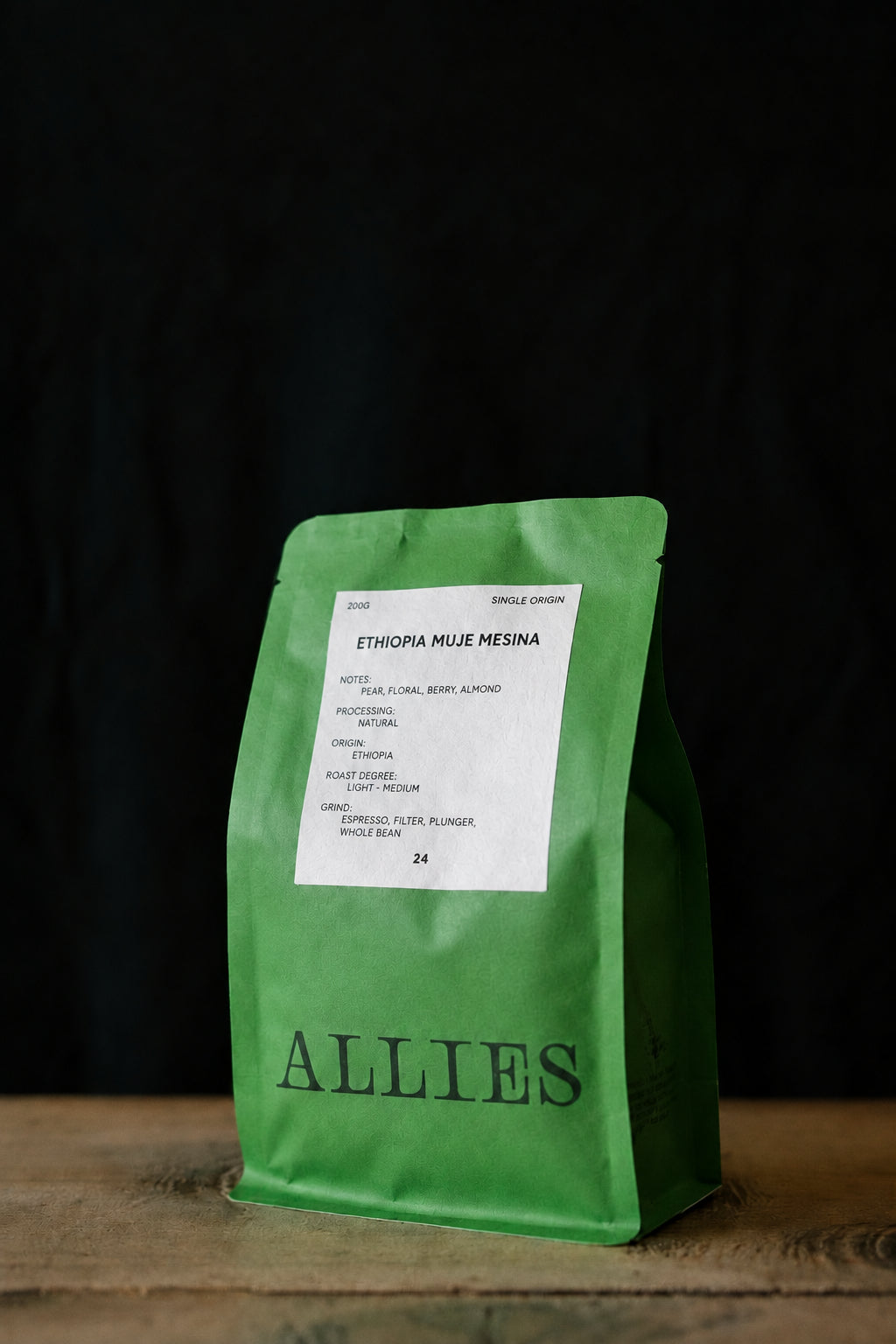 A green bag of Allies coffee, specifically Single Origin Ethiopia Muje Mesina.